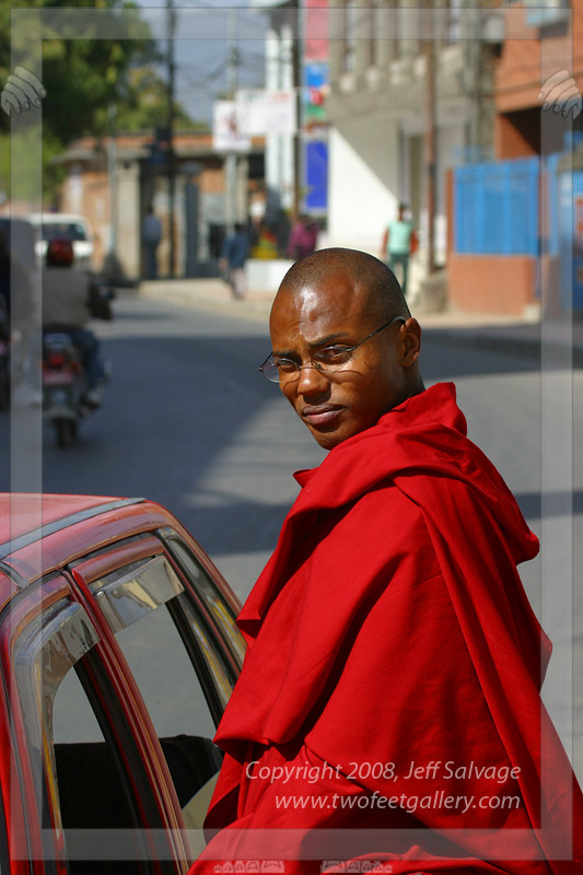 Even Monk's Need a Lift - Kathmandu, Nepal
